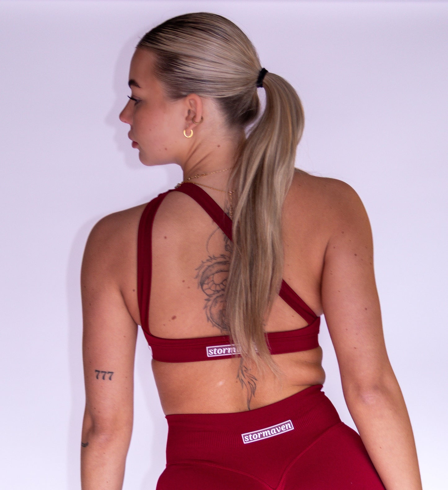 SeamlessSculpt ™ Asymmetric Sports Bra in Cherry Red